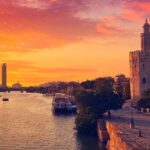 Descubre Andalucía occidental en familia, puesta de sol en la Torre del oro de Sevilla | Sevilla con los peques